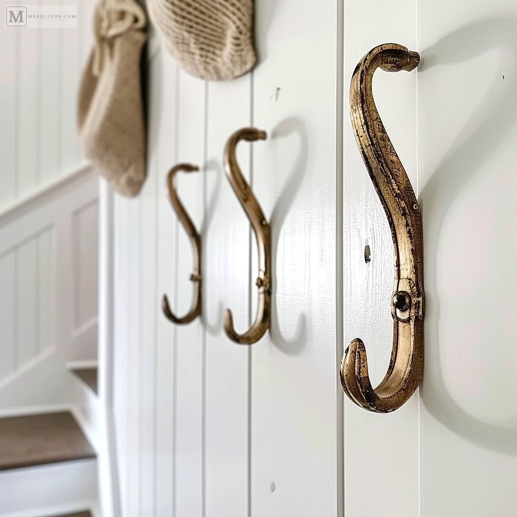Вешалки в прихожую - Antique brass wall hooks on a white hallway wall caa b bd debcfc - 15.01.24 №0001 - mebeltops.com