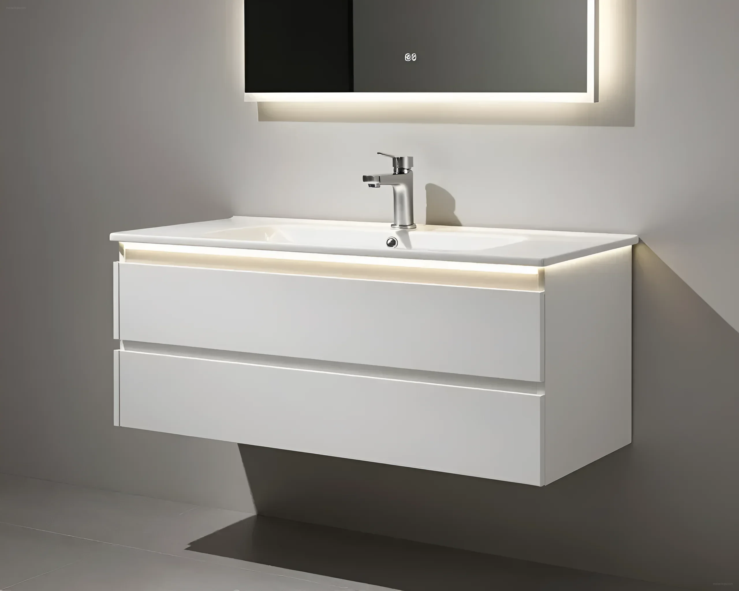 White wall-hung vanity with two drawers and integrated LED lighting, above it a sink and a mirror with lighting.