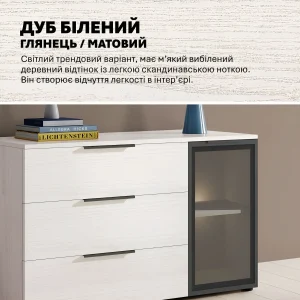 Тумба Flex 1200 мм из ДСП в цвете беленый дуб для гостиной, без ножек, с тремя ящиками и затемненной стеклянной витриной.