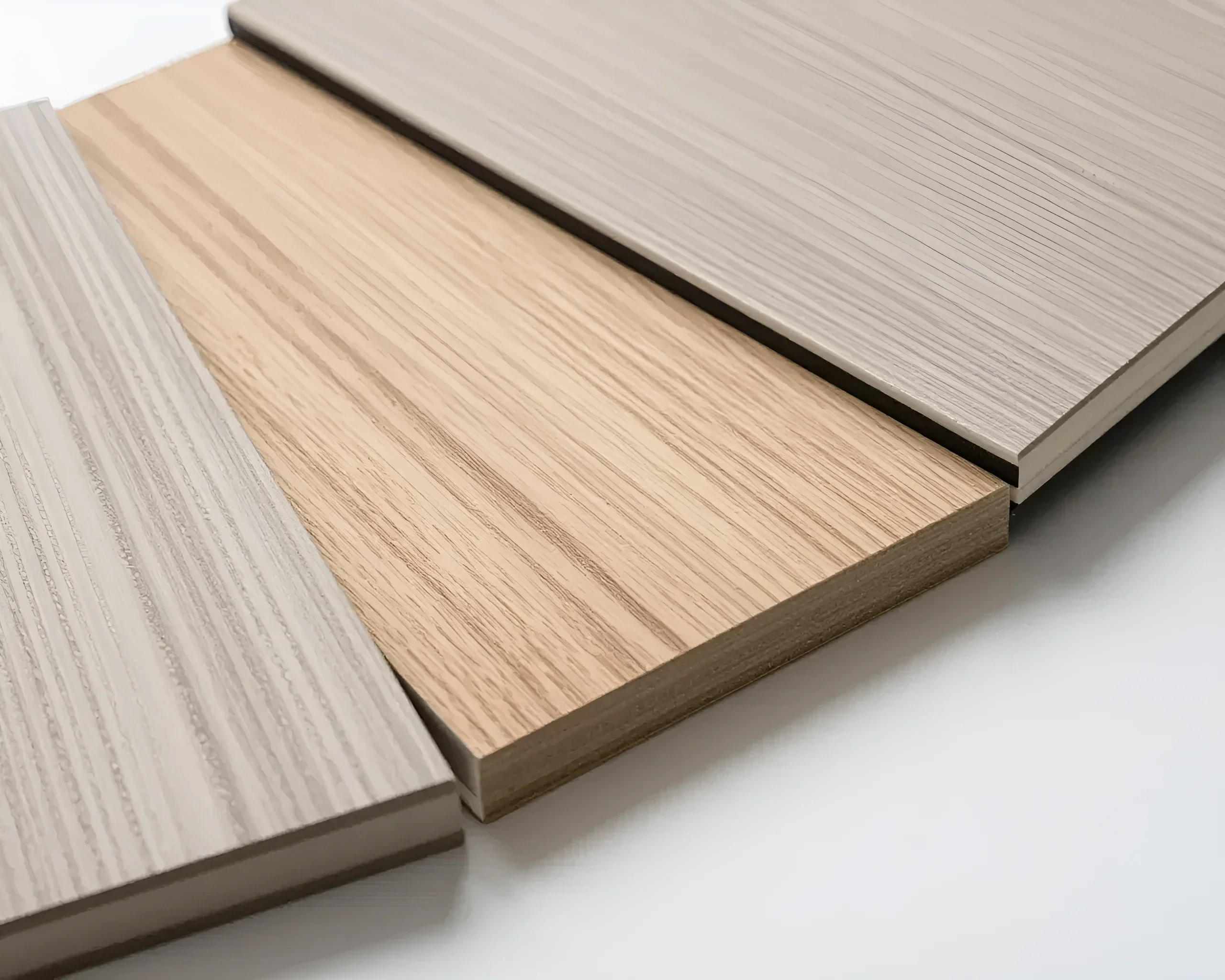 Samples of kitchen facades with wood-like texture in light shades